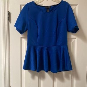 Forever 21 peplum top with mesh insert in the back